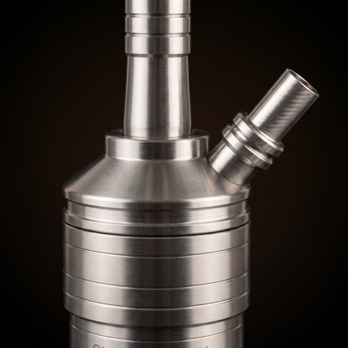 Steamulation Mini Gen II SteamClick 360 closure detail with ribbed stainless housing and hose port, The Premium Way, image 5 of 12