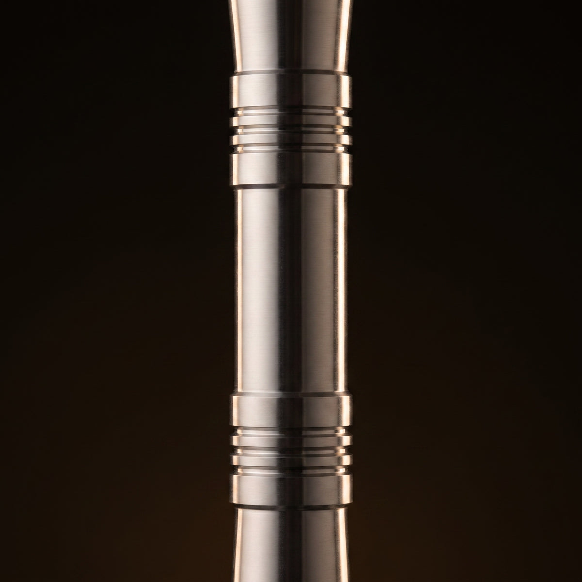 Steamulation Mini Gen II close-up of milled decorative rings on brushed satin V2A stainless stem, The Premium Way, image 3 of 12