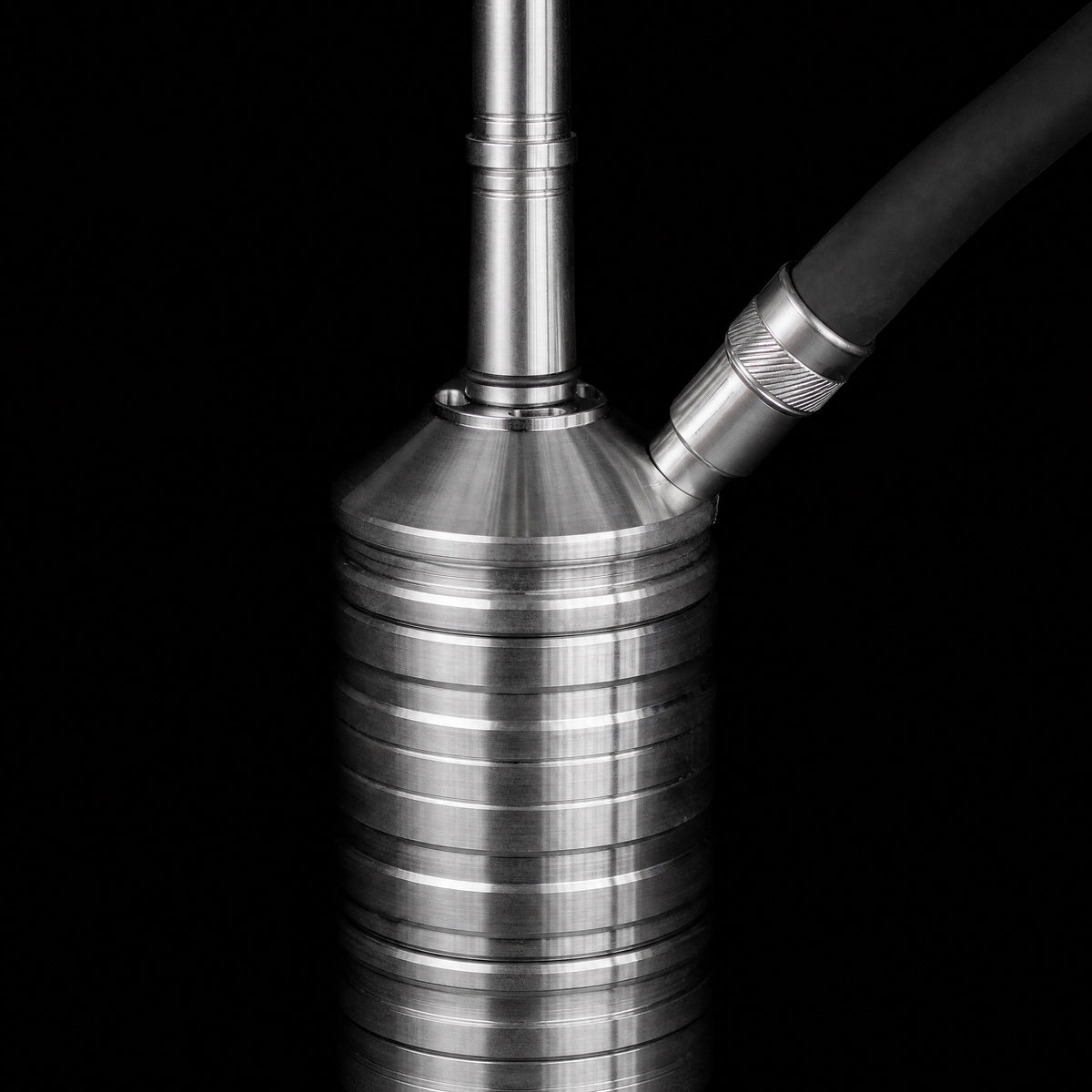 Steamulation Ultimate One Gen II dual connection hose port with hose attached close-up detail, image 4 of 5