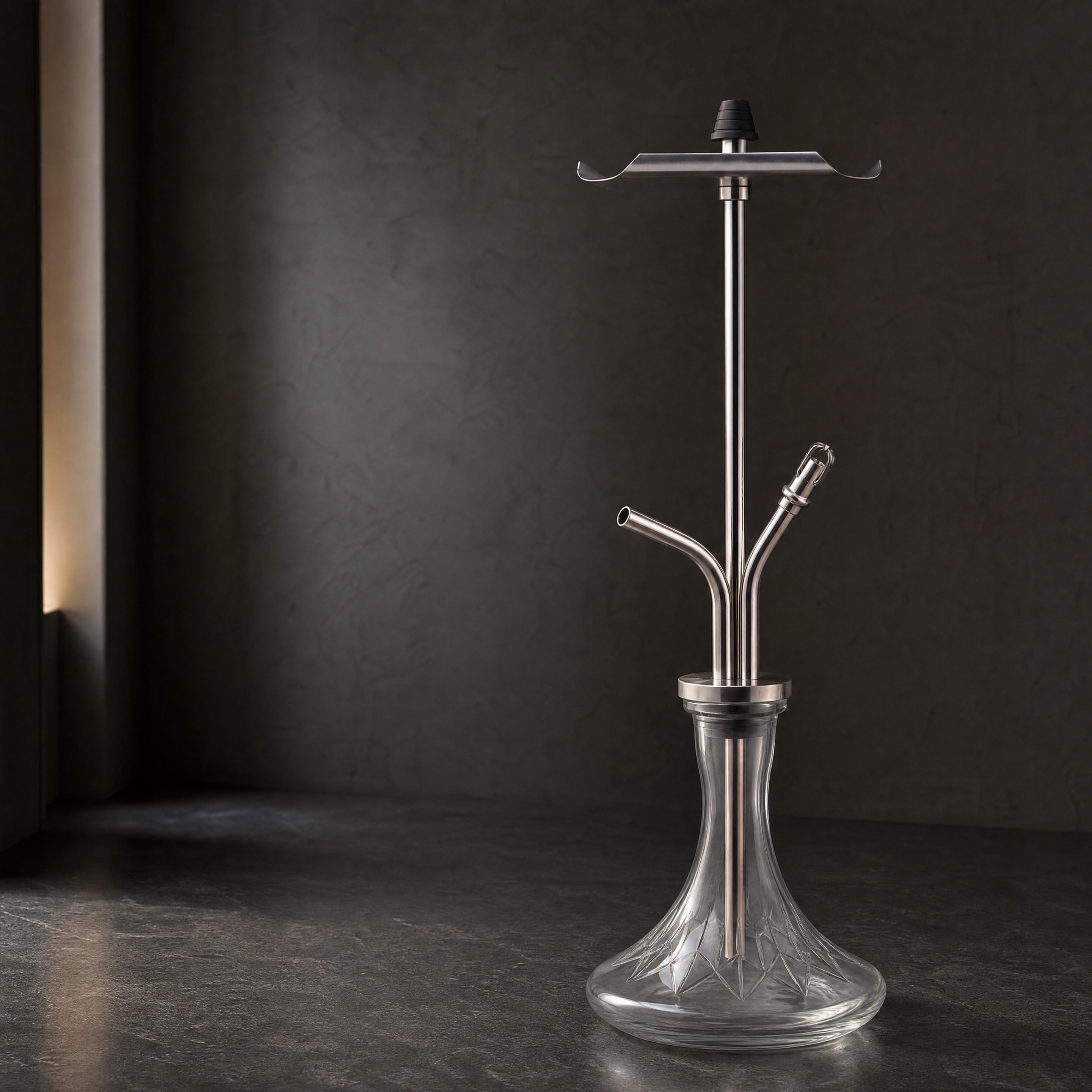 VZ Hookah Classic on polished basalt plinth, modernist interior at dusk, premium Russian-engineered shisha pipe.