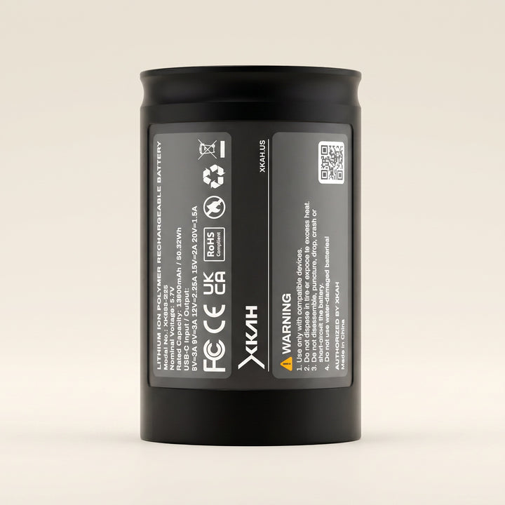 XKAH Pro 13600 mAh replacement battery, matte black cylindrical cell, upright front three-quarter studio view.