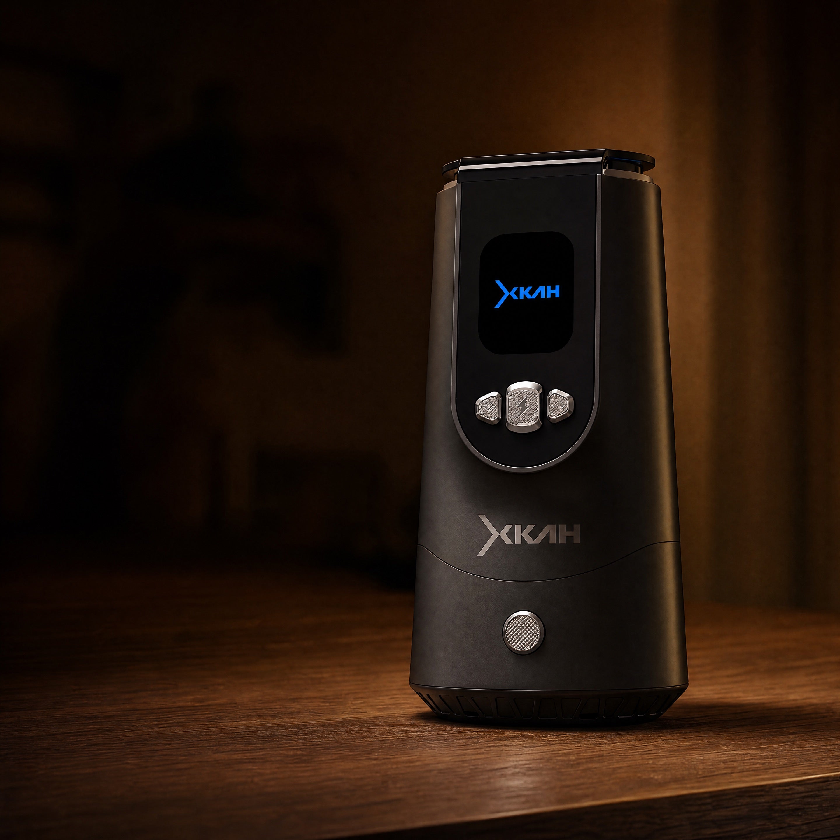 XKAH Pro device on a walnut shelf in a warm evening apartment, cool blue display glowing as the only cold light.