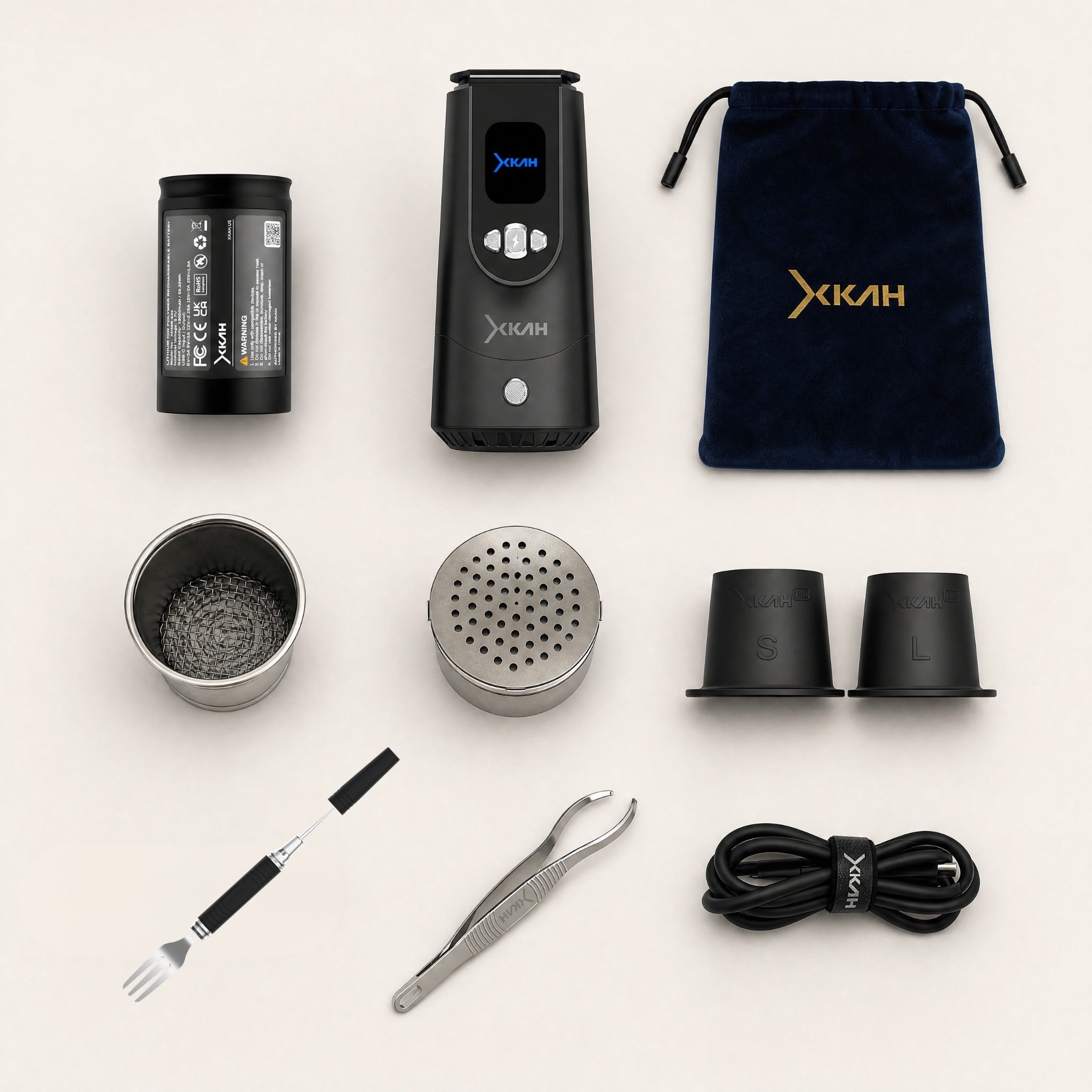 Full XKAH Pro box contents: device, battery, two pods, grommets, packing fork, tweezers, USB-C cable, velvet travel bag.